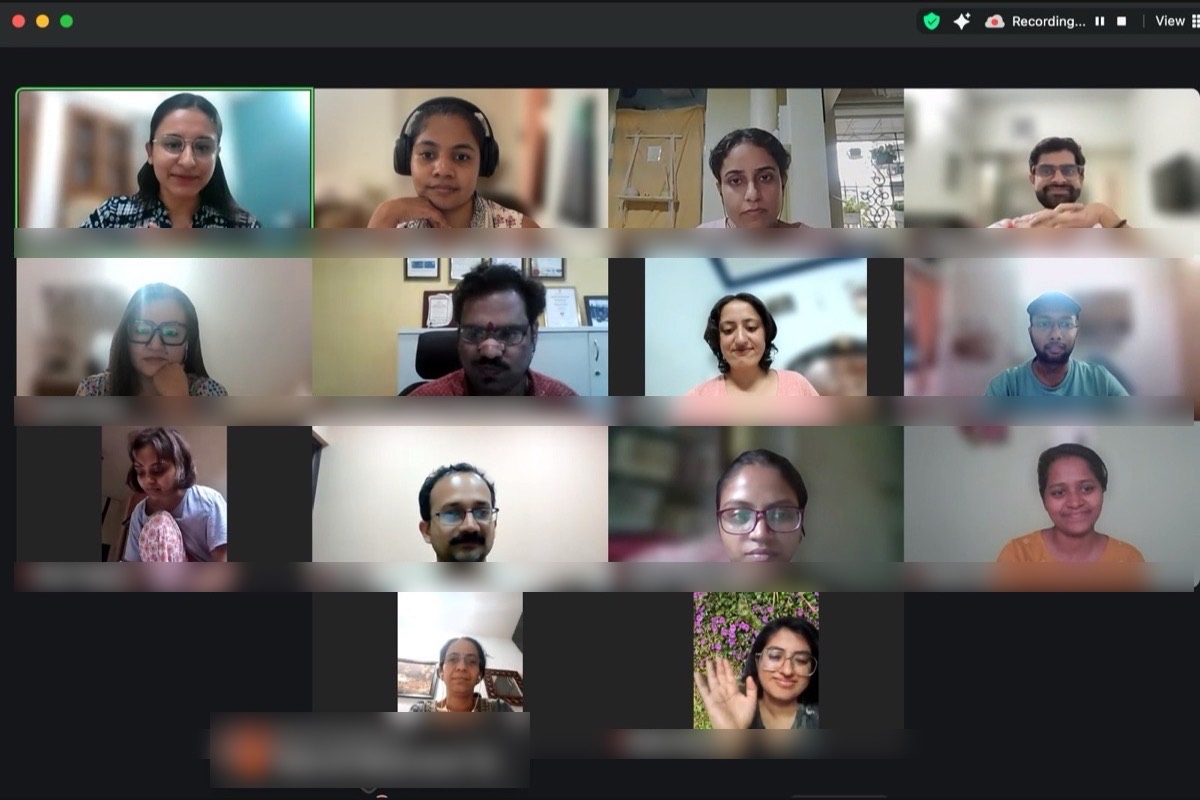A grid of participants at the end of an online circle, a chat message of thanks visible at the foot of the screen
