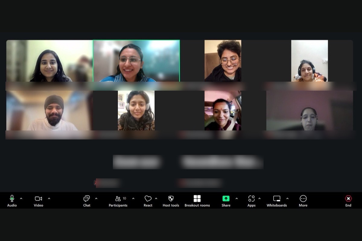A smaller online circle of around ten participants, cameras on