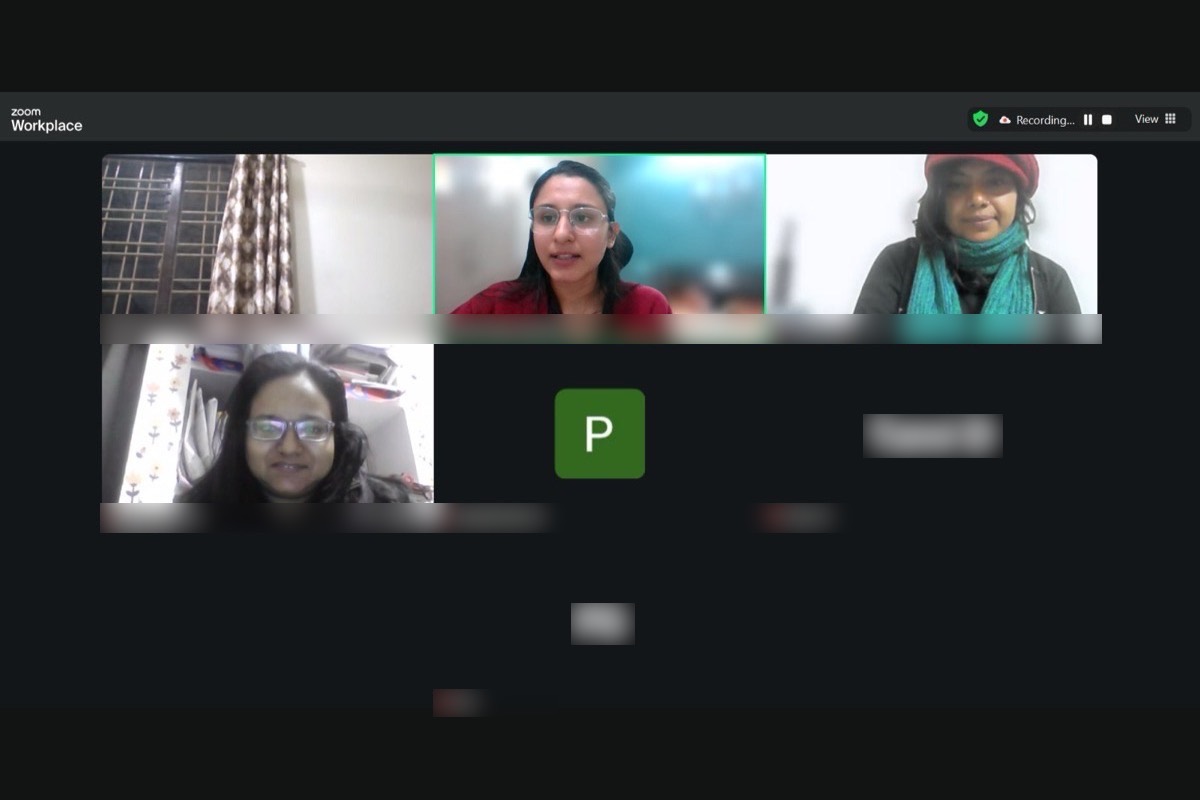 A small online circle of a few participants, the facilitator mid-sentence